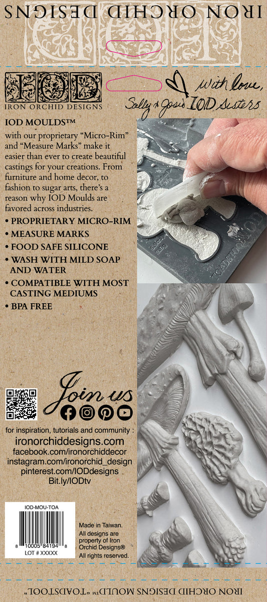 The back cover of the packagin for IOD's "Toadstool" mould. Shows instructions and example mushroom projects.